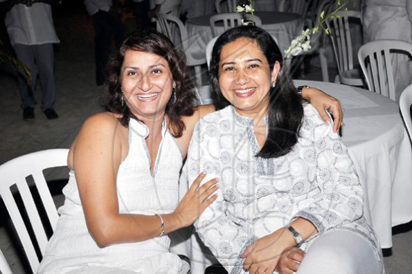 Janet Silvera Photo
 
Aanchal Lofana and Bhavana Thakurani at Rajeesh Kripalani's 40th birthday party at Cornwall Beach in Montego Bay last Saturday night.