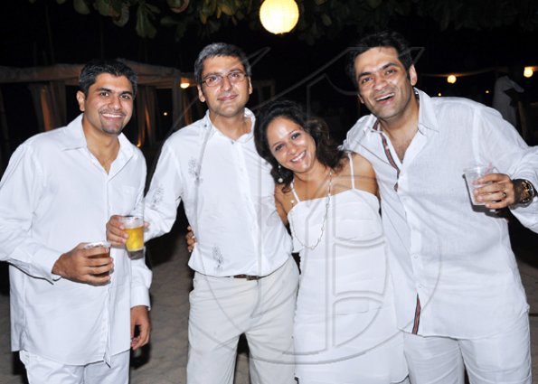 Janet Silvera Photo
 
From L- Kamal Chugani, Vijay Wadhwa and wife Mansi having fun with Rajeesh Kripalani at his 40th birthday party at Cornwall Beach in Montego Bay last Saturday night.