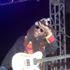 Adrian Frater photo                                                                                                                                                      David Hinds of Steel Pulse takes time out to enjoy the crowd reaction.
