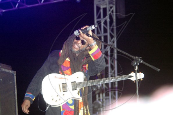 Adrian Frater photo                                                                                                                                                      David Hinds of Steel Pulse takes time out to enjoy the crowd reaction.