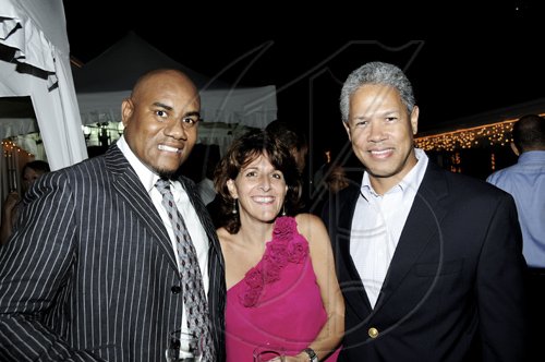 Winston Sill / Freelance Photographer
From left: Devon Evans with Michelle and Donovan Perkins.


************************************************************************************a and American Friends of Jamaica (AFJ) recepotion, held at Hill Road, Norbrook on Monday April 11, 2011.