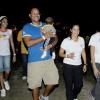 Colin Hamilton/ Freelance Photographer
The Gleaner's Deputy Managing Director Christopher Barnes (second left), carries son Adrian during laps with his wife Isabelle and friends at yesterday morning's Relay for Life.

**************************************************************************************************** on June 13