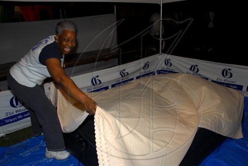 Colin Hamilton/ Freelance Photographer
The Gleaner's Mary Dick is getting ready to snuggle for the night at the scenes from Relay for Life on June 13