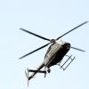 Norman Grindley /Chief Photographer
A Jamaica Defence Force helciopter hovers above West Kingston Mondayday, as gunmen and police trade bullets during an operation in the Hannah Town and Denham Town area.