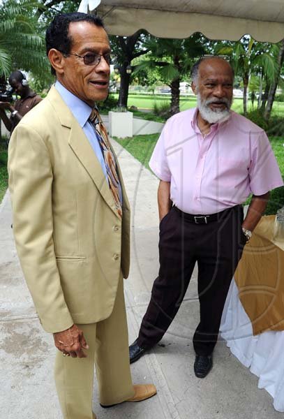 Rudolph Brown/Photographer
Don Topping chat with Ernie Smith at RJR 60th Anniversary long service awards luncheon at the Terra Nova Hotel in Kingston on Friday, July 9-2010.