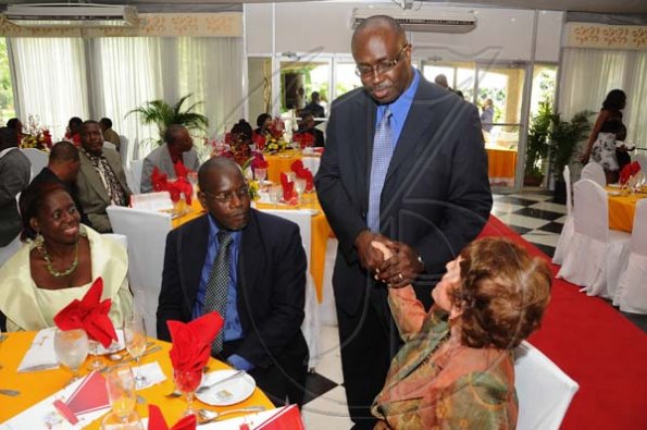 Rudolph Brown/Photographer
RJR 60th Anniversary long service awards luncheon at the Terra Nova Hotel in Kingston on Friday, July 9-2010.