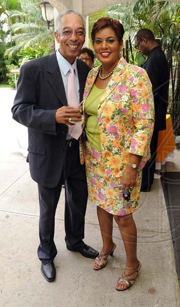 Rudolph Brown/Photographer
Dorraine Samuel-Binger chat with Alan Magnus at RJR 60th Anniversary long service awards luncheon at the Terra Nova Hotel in Kingston on Friday, July 9-2010.