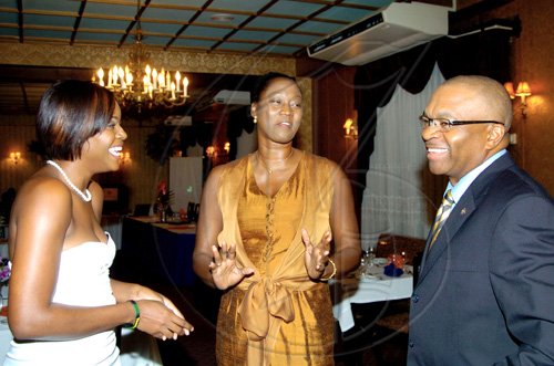 Winston Sill / Freelance Photographer

Yahneake Sterling (from left), President of the Rotaract Club of Liguanea Plains, guest speaker Grace Jackson, and Rotarian Trevor Riley share a laugh before the proceedings.  



**************************************

Rotaract Club of Liguanea Plains, Installation and Awards Ceremony, held at Hotel Four Seasons, Ruthven Road on Friday night July 30, 2010.