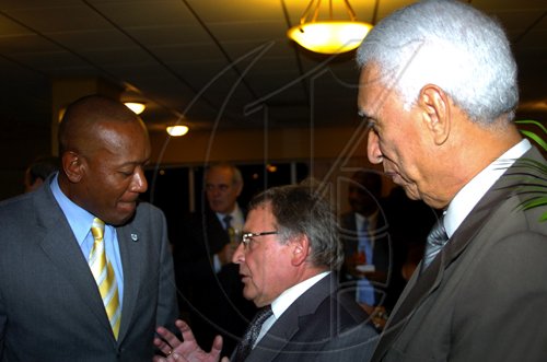 Winston Sill / Freelance Photographer
Russian Ambassador Victor Zotin (centre) raps with Dr Ronald Robinson (left) state minister for Foreign Affairs and Foreign Trade; and Colombian Ambassador Emilio Ventura Diaz Mejia.
host Reception to celebrate the 35th Anniversary of Diplomatic Ties between Jamaica and Russia, held at the Jamaica Pegasus Hotel, New Kingston on Tuesday March 16, 2010.