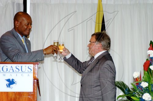 Winston Sill / Freelance Photographer
LEAD PHOTO
State Minister for Foreign Affairs and Foreign Trade Dr Ronald Robinson (left) toasts the continued good relations between Jamaica and Russia with Russian Ambassador Victor Zotin.

*****************************************************************
host Reception to celebrate the 35th Anniversary of Diplomatic Ties between Jamaica and Russia, held at the Jamaica Pegasus Hotel, New Kingston on Tuesday March 16, 2010.