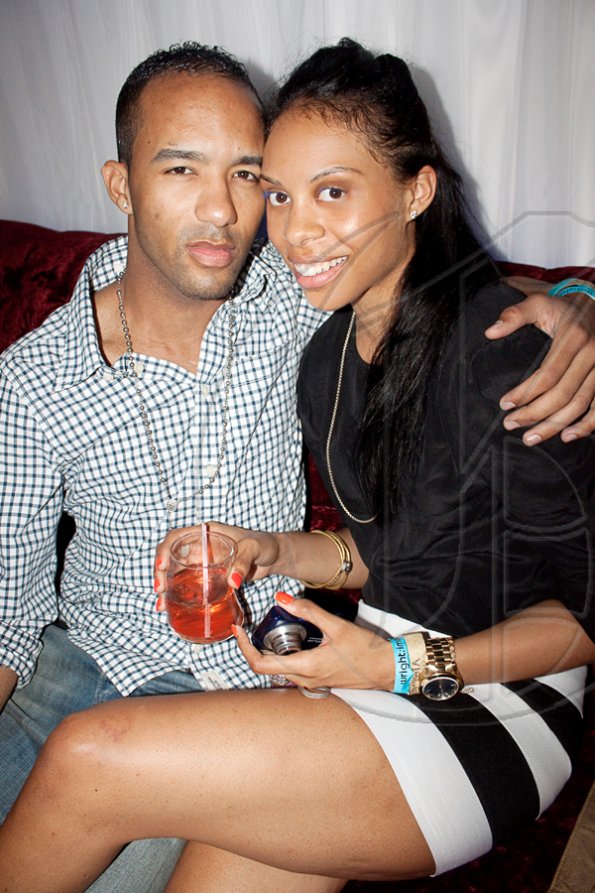 Contributed
 Mahaish Alexander(left) and Eliane Bailey enjoy a drink and a chat at New Kingston's latest hot spot, Club Privilege.