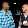 Rudolph Brown/Photographer
Mark Chisholm, (right) vice president, Individual Life Sales, Sagicor chat with Karl Williams, Vice President Human Resources at the Sagicor christmas party at the Office car park in New Kingston on Saturday, December 12-2009