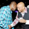 Rudolph Brown/Photographer
Mark Chisholm, (right) vice president, Individual Life Sales, Sagicor chat with Karl Williams, Vice President Human Resources at the Sagicor christmas party at the Office car park in New Kingston on Saturday, December 12-2009