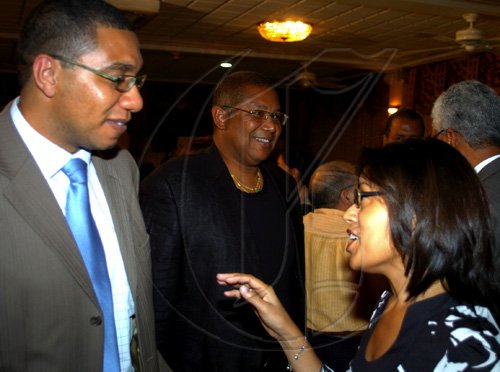 Winston Sill / Freelance Photographer
Launch of Edward Seaga book- "My Life And Leadership, volume one: Clash of Ideologies,1930--1980", held at Mona Visitor's Lodge, UWI Campus on Wednesday March 3
, 2010. Here are Andrew Holness (left); Chris Berry (centre); and D----?? Morrison (right).