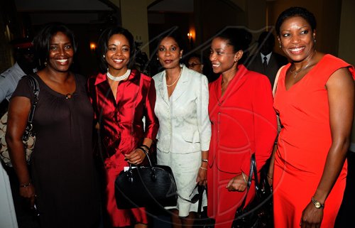 Rudolph Brown/Chief Photographer
Marlene Malahoo Forte, (second left) pose with from right Andrea Cowan, Judith Forth- Blake, Head of Marketing at RBTT Bank, Bernadette Barrow, AGM Small & Medium Enterprises, NCB and Charmaine Harrison before His Excellency Sir Patrick Allen Governor General Swearing in Marlene Malahoo Forte as Senator at King's House on Wednesday, July 15-2009