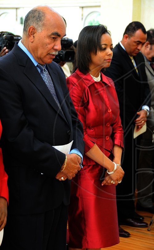 Rudolph Brown/Chief Photographer
Justice Ian Forte, (left) standing his wife Marlene Malahoo-Forte and Christopher Tufton, Minister of Agriculture after His Excellency Sri Patrick Allen Governor General Swearing in Mrs. Marlene Malahoo Forte as Senator at King's House on Wednesday, July 15-2009