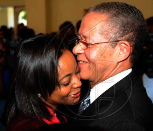 Rudolph Brown/Chief Photographer
Prime Minister Bruce Golding greets Marlene Malahoo-Forte after His Excellency Sir Patrick Allen Governor General Swearing in Mrs. Marlene Malahoo Forte as Senator at King's House on Wednesday, July 15-2009