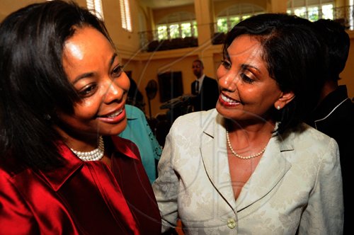 Rudolph Brown/Chief Photographer
Bernadette Barrow, (right) AGM Small & Medium Enterprises, NCB chat with Marlene Malahoo-Forte after is His Excellency Sir Patrick Allen Governor General Swearing Mrs Marlene Malahoo Forte as Senator at King's House on Wednesday, July 15-2009