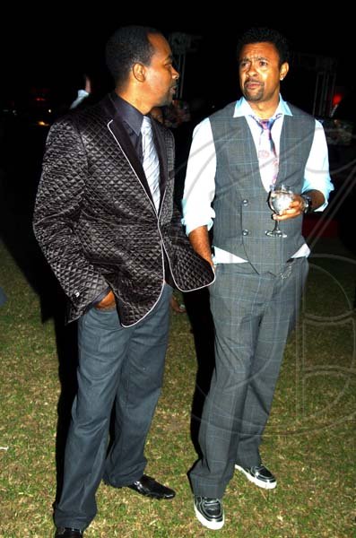 Winston Sill / Freelance Photographer
Both Shaggy (left) and David 'Squeeze' Annakie, from Jamrock Magazine and Link-up Media in New York are looking very "slick" as they kick back and enjoy a drink before the show. Annakie bought Usain Bolt's shoe for $355,000 at last year's auction which was a segment of the Shaggy and Friends show.r   



**********************************************************

Shaggy Foundation presents "Shaggy and Friends 2010  Concert", held on the lawns of Jamaica House, Hope Road on Saturday night January 2, 2010.