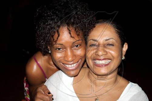 Judging from the smiles displayed by Debbie Broderick (left) and Marie Matthews, we think we can declare "Jamaica's first Organic Farm Dinner" a success!