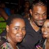 Singer D-Major (centre) shows some "Real Friends" love to (from left) Tamina-Shimone Green and Monique Matheson at Allstar Thursdays.