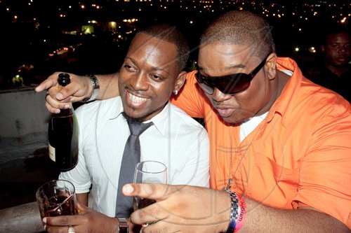A chic New Kingston roof-top party, good company and a bottle of champagne...it's a unbeatable combination for brothers Andrew (left) and Sam French at 'W'.