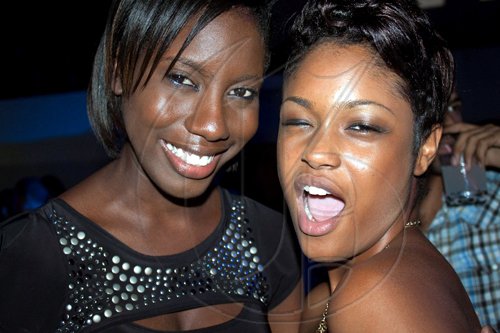 Feisty! Denieze Anderson (right) and Kareen Williams give us a little attitude with a 

smile as our cameras pass their way at 'W'.