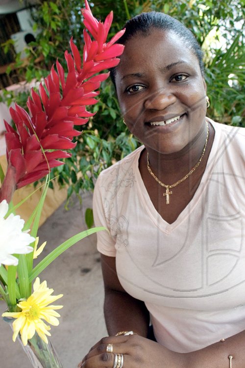 Pretty flowers for a pretty lady! Nadine Burrell takes a break from her position as general manager at Rory's Texaco, to attend 'The Ultimate Mother's Day Brunch' held on Sunday at Boone Hall Oasis.