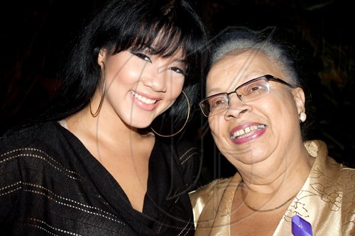 The inspiration for the 'Iron Butterfly' charity event, renowned former St. Andrew High School principal, Dr. Dahlia Repole joins one of the night's performers, Tessanne Chin. Held on the lawns of the Jamaica Pegasus, the event was in aid of The Dahlia Repole Foundation which supports the fight against pancreatic cancer.