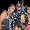Equiknoxx music producer Derrick Coffie wasn't short of arm candy at 'Musique', surrounded by lovely ladies, (from left) Ayesha Dawes, Latifa 'Tifa' Brown and Crystal Gordon.