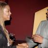 Pulse chairman, Kingsley Cooper, is entranced by the dimpled smile of Terian Cunningham, managing director of Gabriellas' Cosmetics, at the Caribbean Fashion Week Launch.