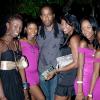 Arvel Grant (centre) of HQ Events, is not short of female attention at his recent event 'Champellé,'as patrons (left to right) Tamara Graham, Sarah Bennett, Terri-Ann Campbell, Kelly-Ann Campbell and Sasha-Rae Holness flock to his side. Leave some ladies for your male guests, Arvel!