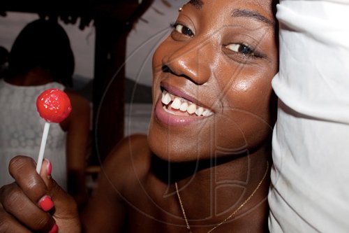 Everybody loves a lolly! Popular dancer, Mystic, takes some time for a sweet treat at Royal Emirates.