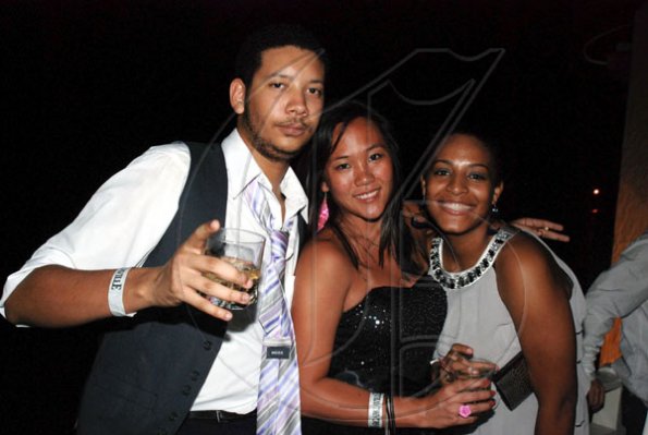 Janet Silvera Photo
 
Shane Parnell, Rachel Lee (centre) and Kimberly Minott took ocean view seats at the Blue Beat party.




 at Blue Beat's 'Soiree Bourgeoise' 18th century French themed New Year's Eve party last Thursday night in Montego Bay.