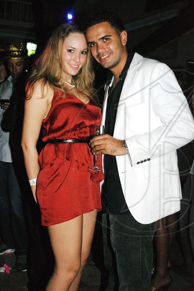 Janet Silvera
Young entrepreneur Israel Pringle rang in 2010 with his better half Raina Morrison the Blue Beat event.





. last Thursday night at Blue Beat's 'Soiree Bourgeoise' 18th century French themed New Year's Eve party in Montego Bay.