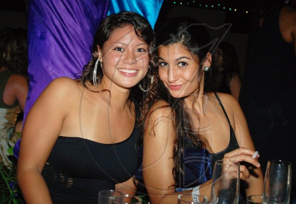 Janet Silvera Photo
 There was no other place Christie Chuck (left) and Mariana Bloomfield wanted to be to ring in 2010.



couldn't have wanted a better night than last Thursday as they partied at Blue Beat's 'Soiree Bourgeoise' 18th century French themed New Year's Eve party in Montego Bay.