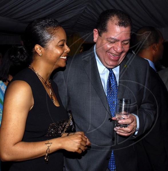 Colin Hamilton/Freelance Photographer
Senator Marlene Malahoo Forte and Finance Minister Audley Shaw have some fun during the Spanish National Day reception at the Spanish Ambassador's residence on Tuesday October 13, 2009.