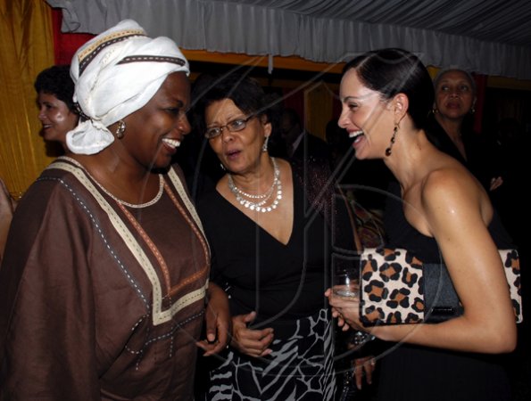 Colin Hamilton/freelance photographer
From left, Ambassador of Senegal Dr. Nafissatou Diagne,   Mrs Vilma Baugh and Annmarie Vaz share a light moment during the Spanish National Day reception at the Spanish Ambassador's residence on Tuesday October 13, 2009.