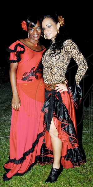 Colin Hamilton/freelance photographer
Dominique Robinson  (left) and Elizabeth Hamze, a  dancer at the Bahia Principe caught many admiring eyes at the Spanish National Day reception.

******************************************************************************** at the Spanish Ambassador's residence on Tuesday October 13, 2009.
