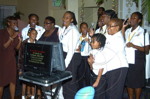 Winston Sill/Freelance Photographer
Gleaner Representatives and spellers enjoying the music at the Spelling Bee dinner, from left are emcee Jennifer 'Jenni Jenni' Small, Lois Robinson, Tenesica Watson, Shernett Robinson, Tenesicia Malcolm, Teneel Palmer, Daviesh Mills, Terry-Anne Wilson, Jenelle Hinds, Lariecia Harvey and Karin Cooper.