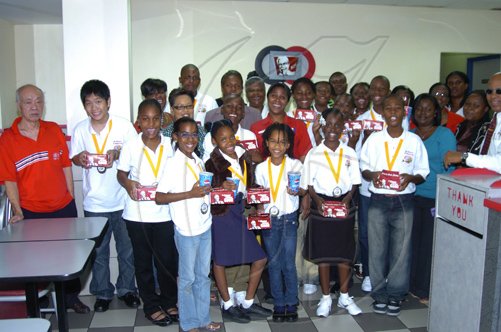 Winston Sill/Freelance Photographer
Restaurants of Jamaica (KFC) treated the parish champions and their coaches to dinner at their New Kingston Branch.