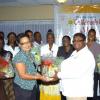 Winston Sill/Freelance Photographer
Shernett Robinson, The Gleaner's Western Bureau Manager, presents a gift basket on behalf of Nestle Jamaica Ltd to Champion Teacher Primrose Swaby.