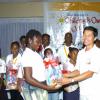 Winston Sill/Freelance Photographer
Dr. Clive Lai, Spell Master presents a gift basket on behalf of Kirk Distributors Limited to Jenelle Hinds, St. Mary Parish Champion.