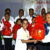 Winston Sill/Freelance Photographer
Paula Blake-Asphaal, Sales Manager of Jamaica Flour Mills presents a gift basket to Andriena Cribb, St. James Parish Champion.