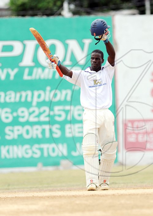 Ricardo Makyn/Staff Photographer.
Kingston's Chadwick Walton celebrates scoring a century against Melbourne, during their Jamaica SuperCricketLeague encounter at Melbourne on Sunday.