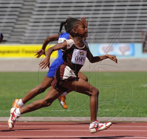 Ricardo Makyn/Staff Photographer.
Foreground Kimberley Stewart of Our Lady of the Angels Prep Winning Heat 2 of the Girls Class 3  50 Metres race  at the Bigga/Jisa Prep School Champs on Day Two at the National Stadium on Friday 5.6.2009.