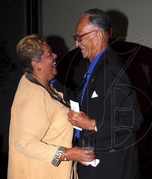 Colin Hamilton/freelance photographer
Dr Alfread Sangster and Aloun Assamba up-close and elated during the St. Elizabeth Homecoming Foundation 17th Annual Golden Awards Banquet held at the Pegasus Hotel on Wednesday November 25, 2009.