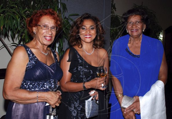Colin Hamilton/freelance photographer
Claudia Goldson-Rae (C)?with her mother Lauris Goldson (L) and aunt Dr. Joyce Robinson (R) during the St. Elizabeth Homecoming Foundation 17th Annual Golden Awards Banquet held at the Pegasus Hotel on Wednesday November 25, 2009.