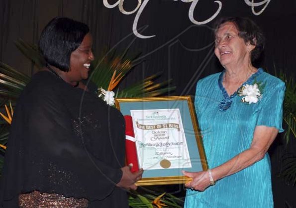 Colin Hamilton/freelance photographer
Kathleen G. Lodge JP?(R) receives a Golden Book? Education Award from Mrs Donna Parchment Brown during
St. Elizabeth Homecoming Foundation 17th Annual Golden Awards Banquet held at the Pegasus Hotel on Wednesday November 25, 2009.