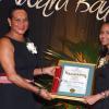 Colin Hamilton/freelance photographer
Camille Witter (R) receives on behalf of her father Kenneth B. Witter?a Posthumous?Golden Hand Award for community service from Mrs Paulette Brennan during the St. Elizabeth Homecoming Foundation 17th Annual Golden Awards Banquet held at the Pegasus Hotel on Wednesday November 25, 2009.